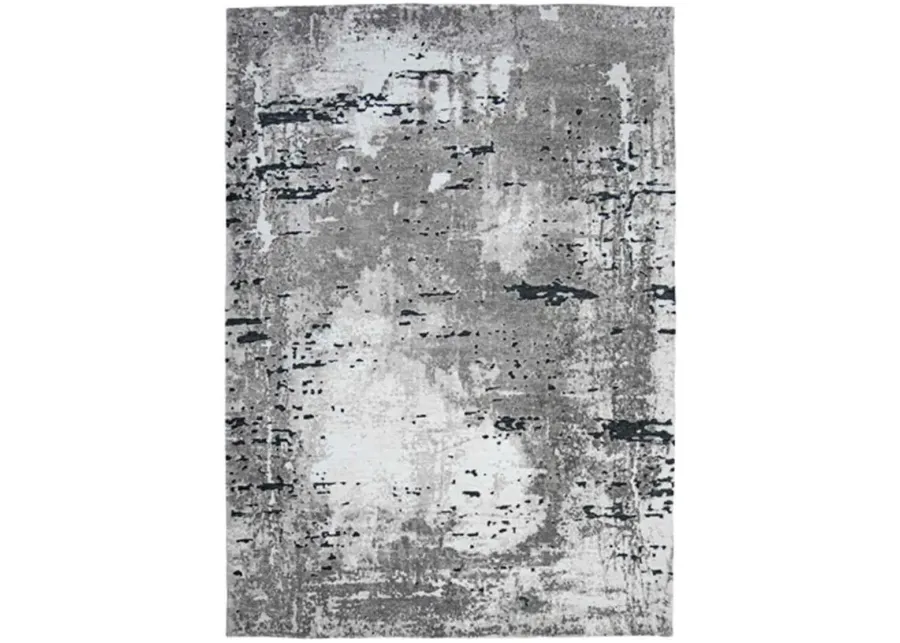 Signature Design by Ashley® Aworley Gray/White 5'x7' Medium Area Rug