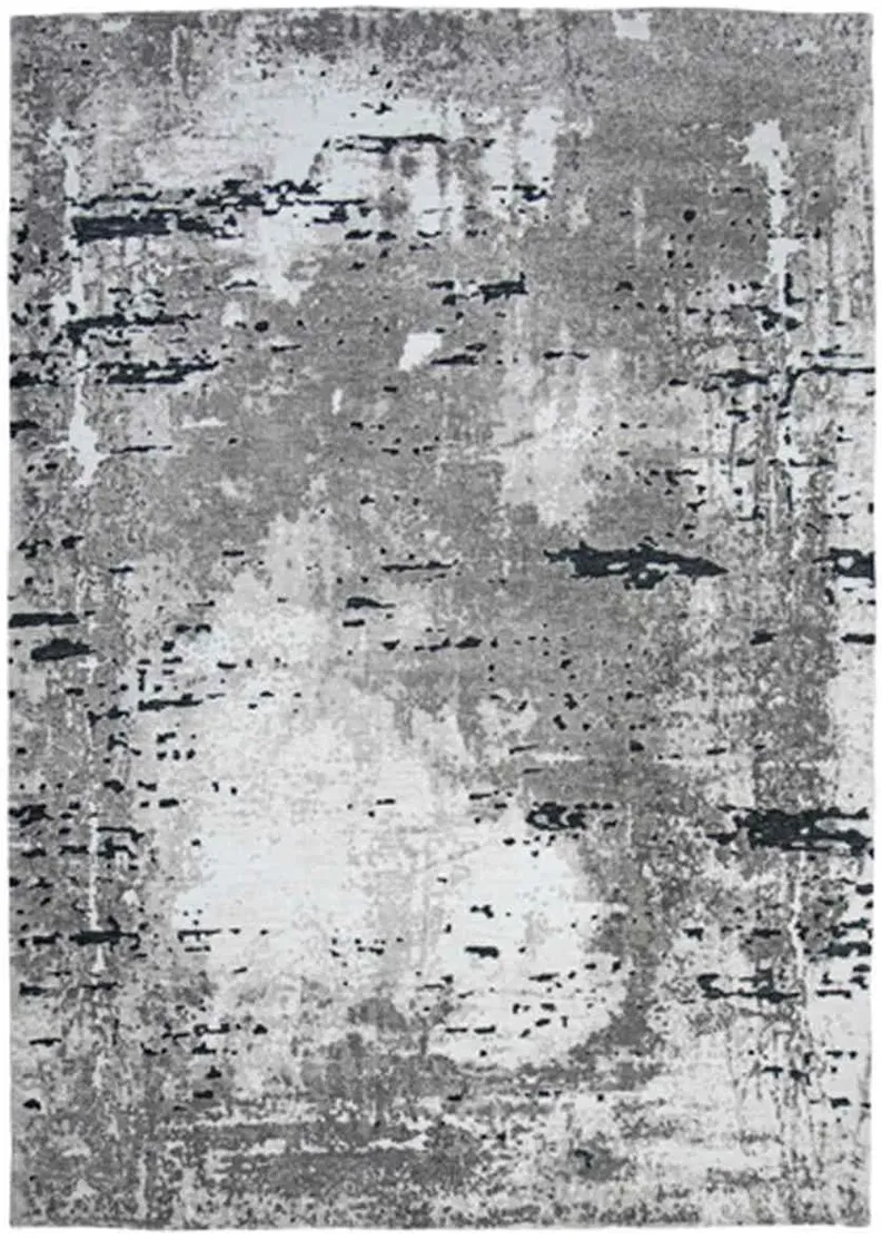 Signature Design by Ashley® Aworley Gray/White 5'x7' Medium Area Rug