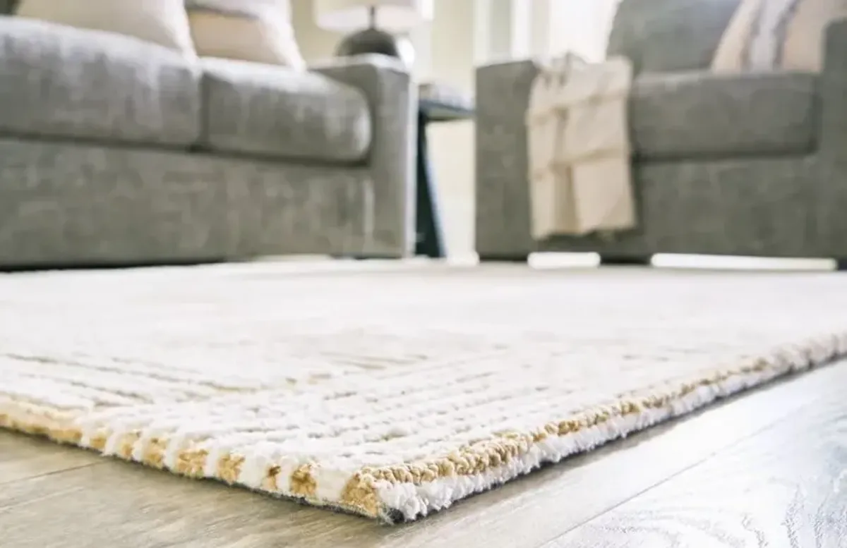 Signature Design by Ashley® Adanmund 5'x7' Medium Area Rug