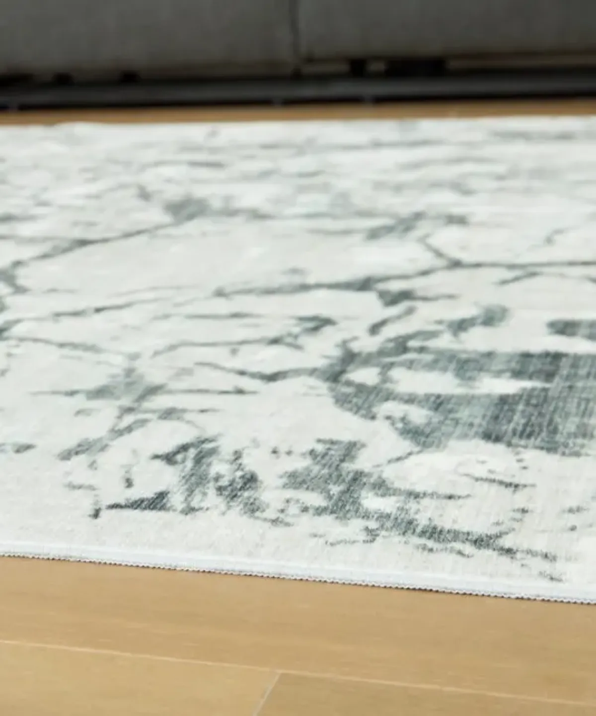 Signature Design by Ashley® Tobinbury Gray 5'x7' Medium Area Rug