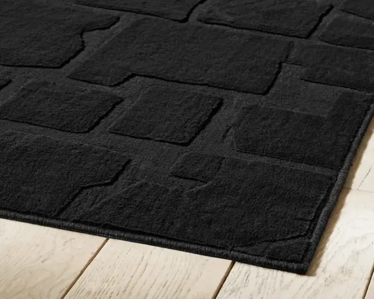 Signature Design by Ashley® Gibbswell Black 5'x7' Area Rug