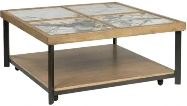 Signature Design by Ashley® Montia Brown Cocktail Table with Black Base