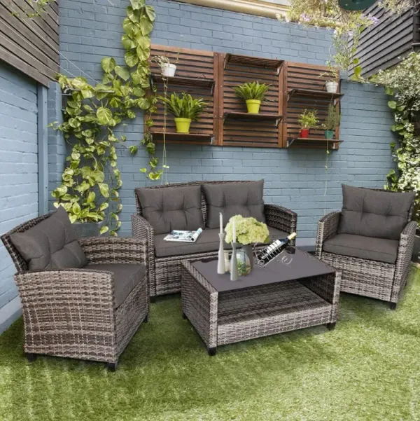 4 Pieces Patio Rattan Furniture Set with Coffee Table and Cushioned Sofa