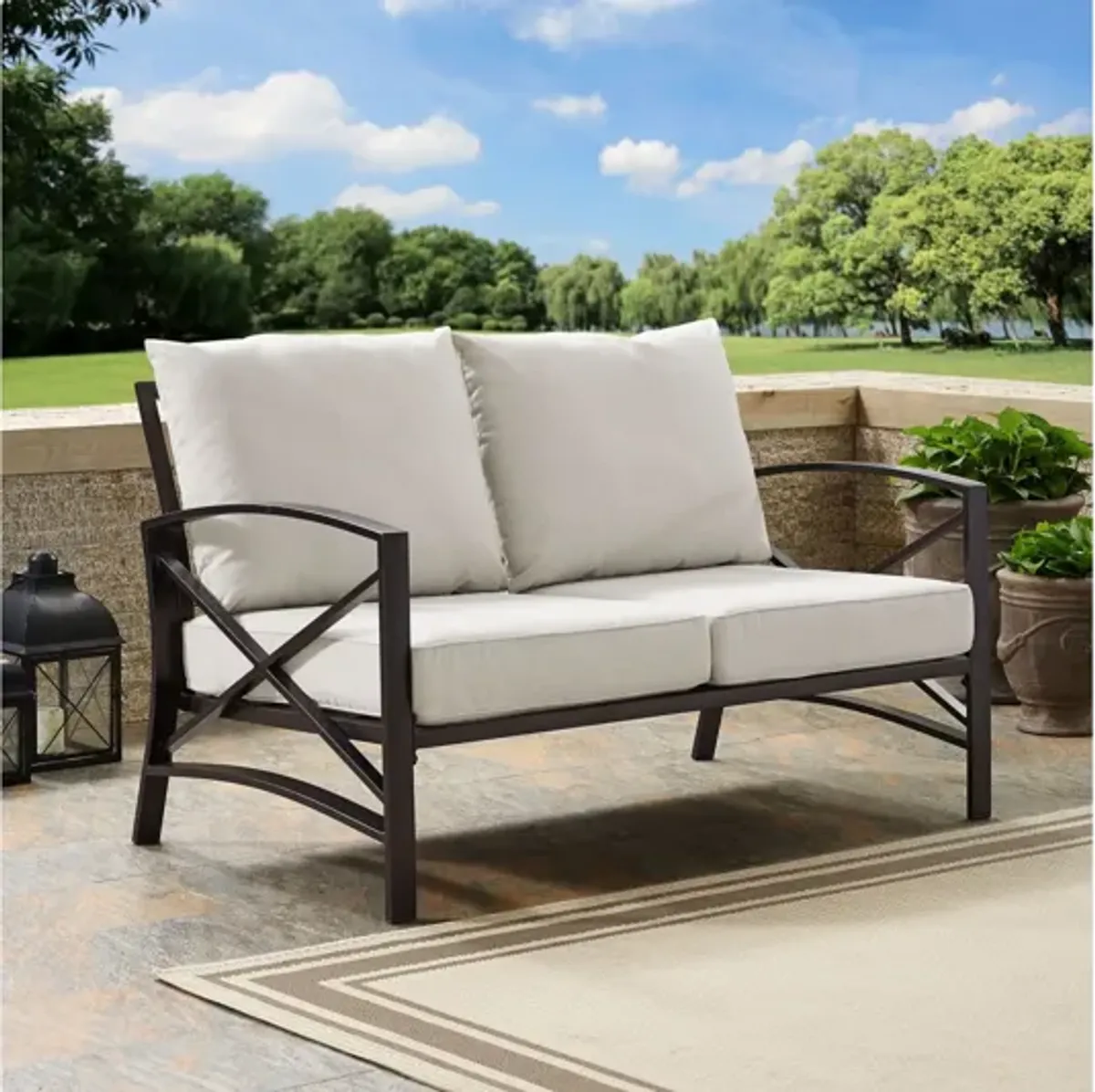 Kaplan Loveseat in Oiled Bronze with Oatmeal Cushions