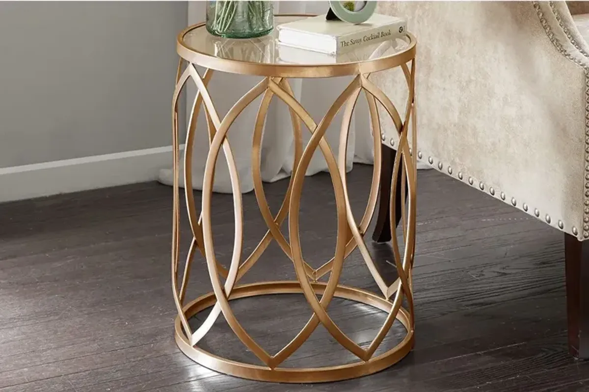 Arlo Metal Eyelet Accent Table in Gold by Madison Park