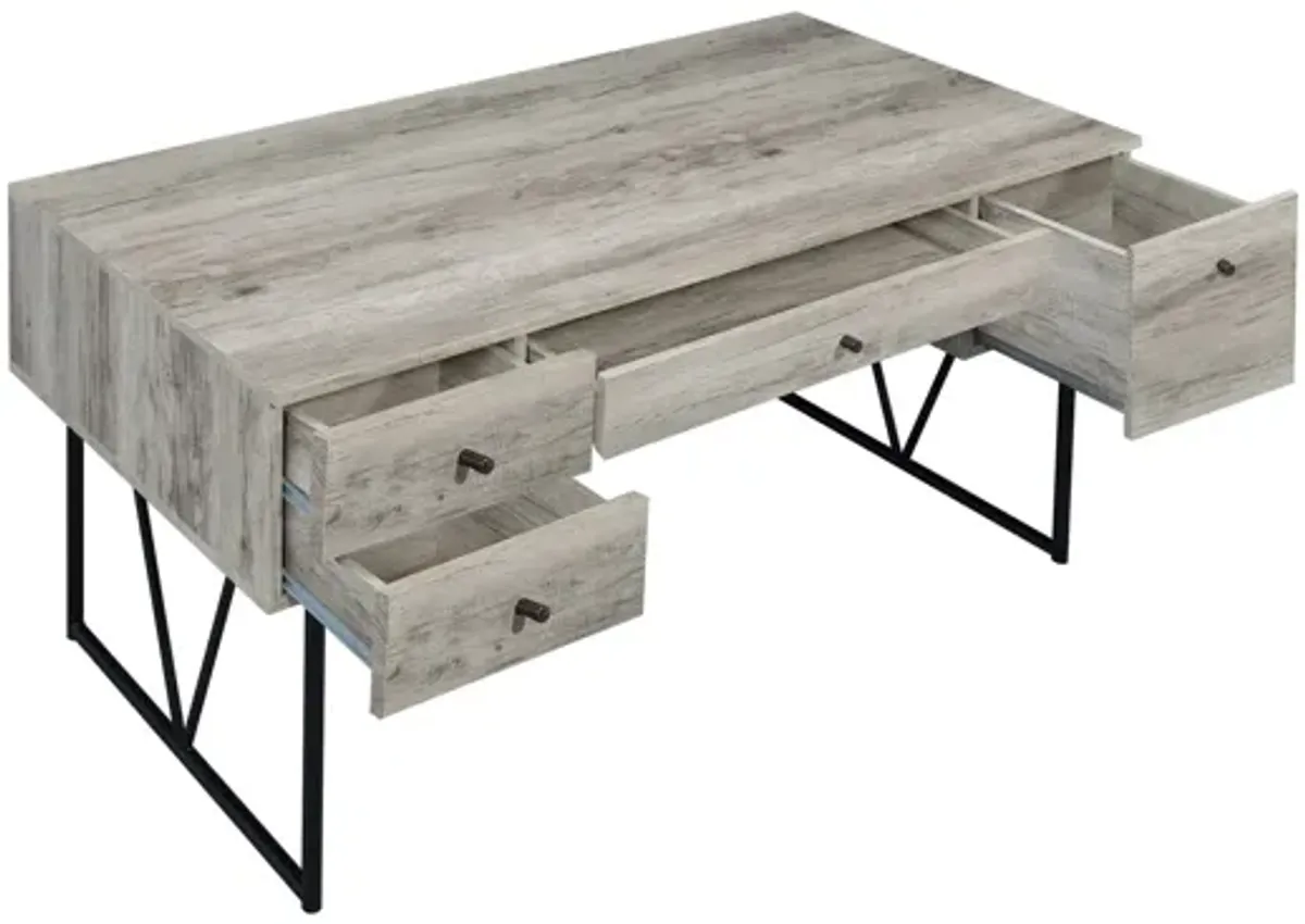 Analiese 63" 4-drawer Writing Desk - Grey Driftwood