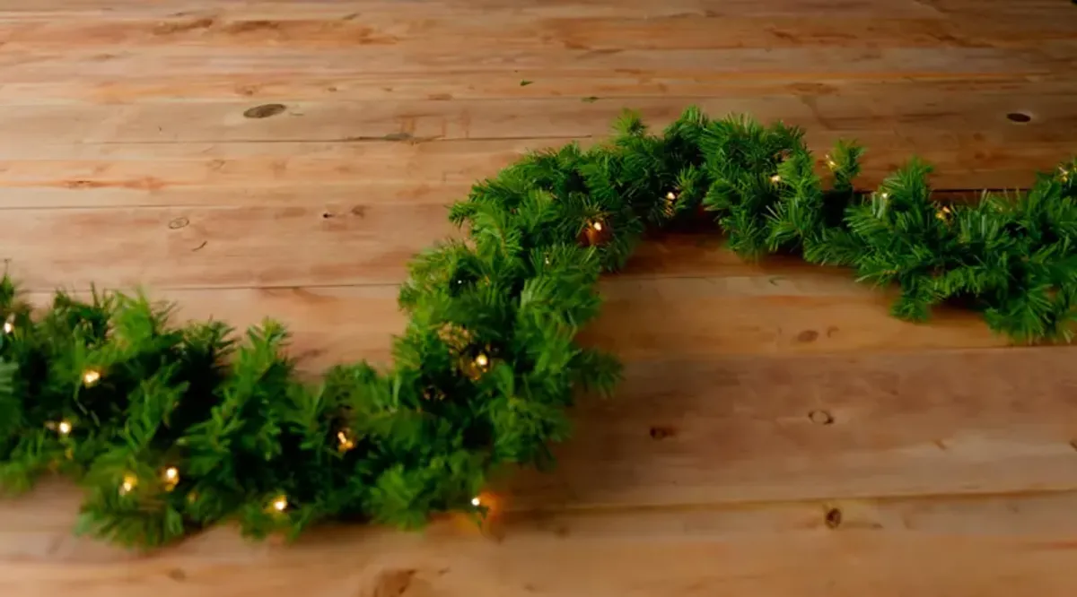 Continental 9  Pre-Lit Artificial Pine Garland With Clear Lights