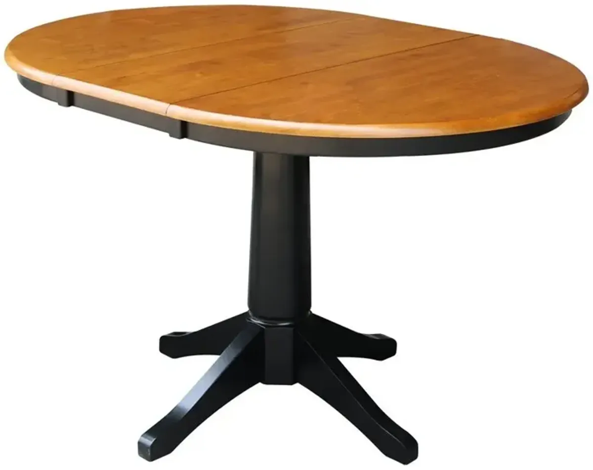 DINING ESSENTIALS 36 INCH EXTENSION TABLE WITH 30 INCH TRANSITIONAL PEDESTAL BASE IN CHERRY/BLACK