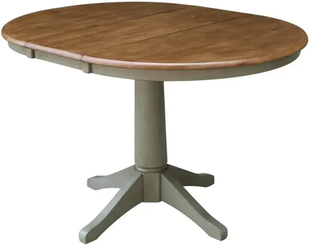 DINING ESSENTIALS 36 INCH EXTENSION TABLE WITH 30 INCH TRANSITIONAL PEDESTAL BASE IN HICKORY/STONE