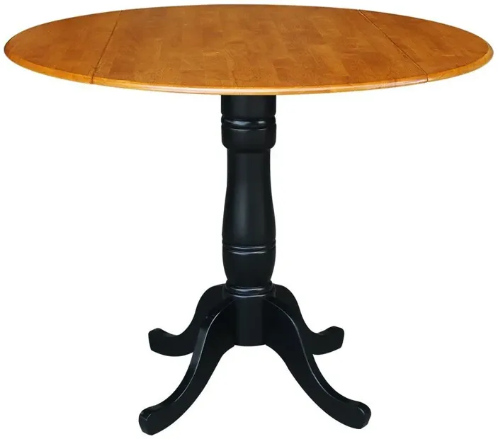 DINING ESSENTIALS 42 INCH DROP LEAF TABLE TOP WITH 36 INCH TRADITIONAL PEDESTAL BASE WITH EXTENSION IN CHERRY/BLACK