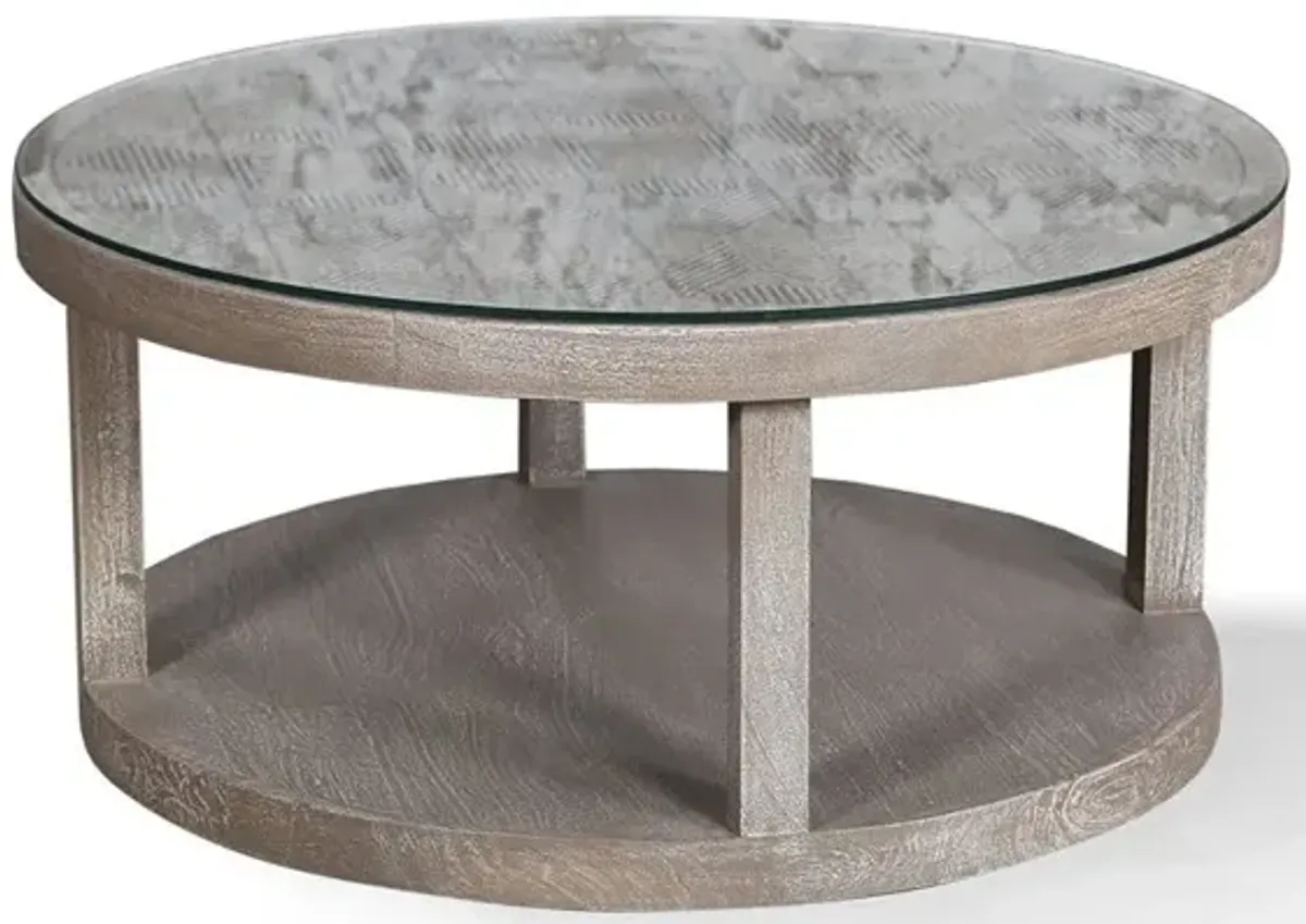 CROSSINGS SERENGETI ROUND COCKTAIL TABLE WITH GLASS TOP