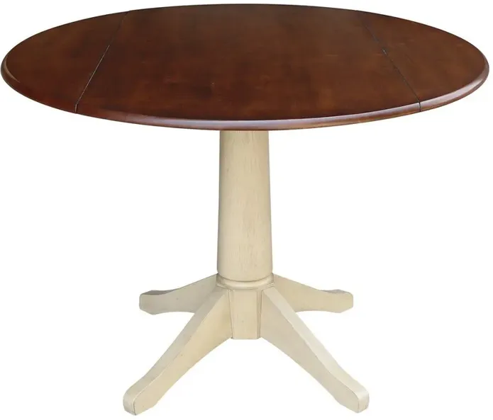 DINING ESSENTIALS 42 INCH DROP LEAF TABLE TOP WITH 30 INCH TRANSITIONAL PEDESTAL BASE IN ESPRESSO & ALMOND