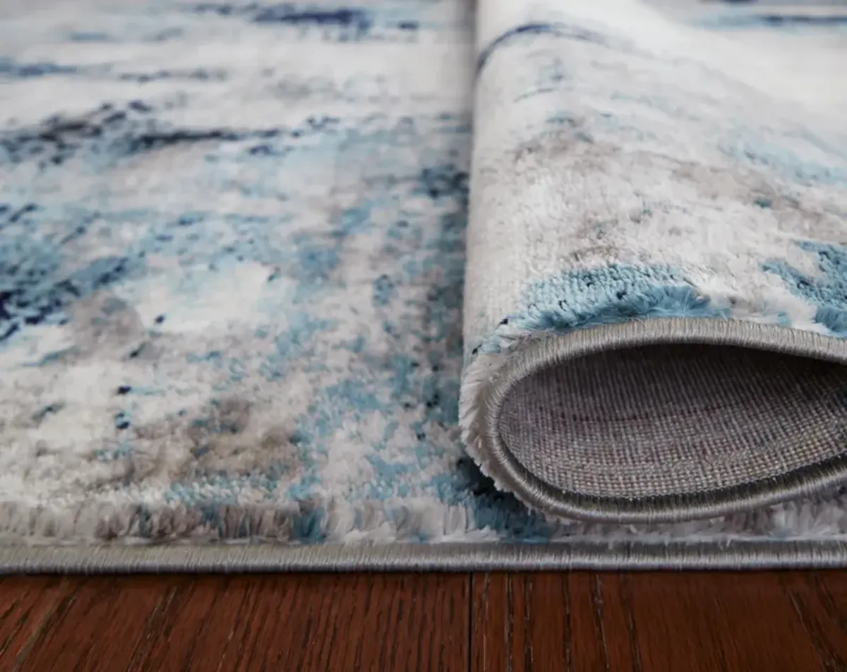 Ashley Leonelle Large Rug Cream/Blue/Gray Signature Design