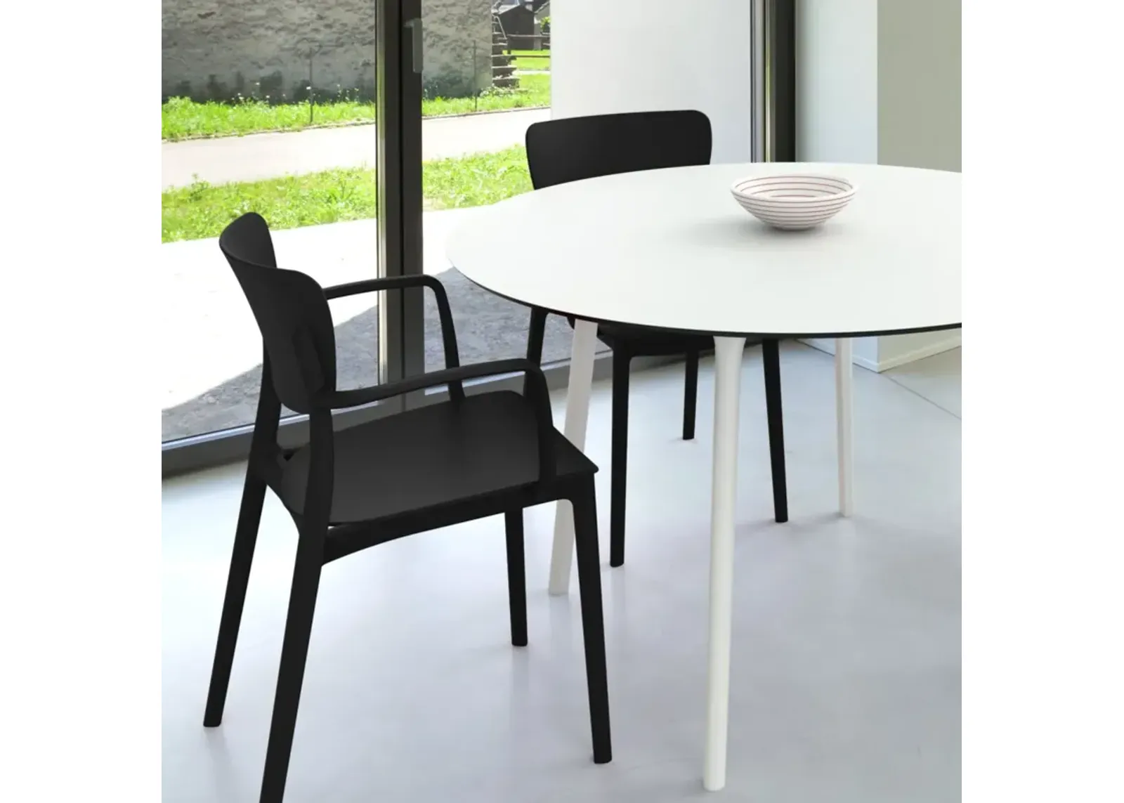 Compamia 47 Inch Lisa Round Outdoor Dining Set with White Table & Black Armchairs