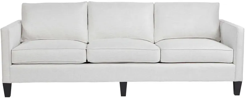 HARRISON MODERN SOFA, BODY IN CAROLINA IVORY, PILLOWS IN JUNO BLACK AND PAXTON CLASSIC, ONYX LEG FINISH, STANDARD UNIBLEND SEAT CUSHION CORES