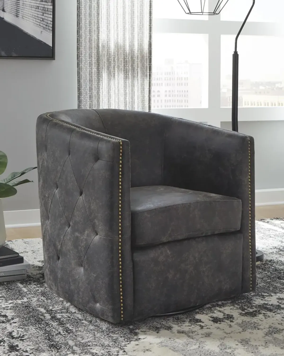 Ashley Brentlow Distressed Black Swivel Barrel Chair