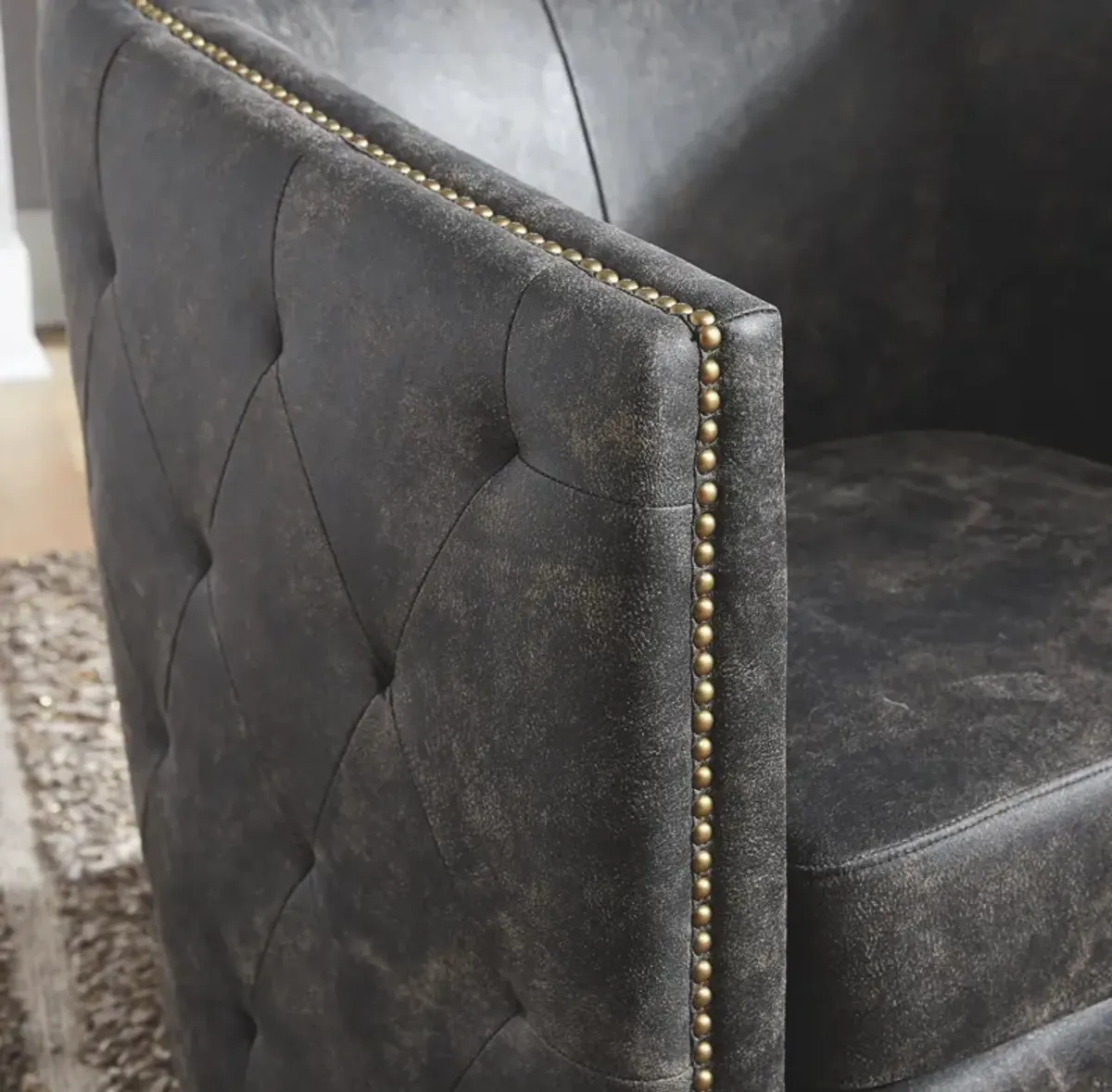 Ashley Brentlow Distressed Black Swivel Barrel Chair