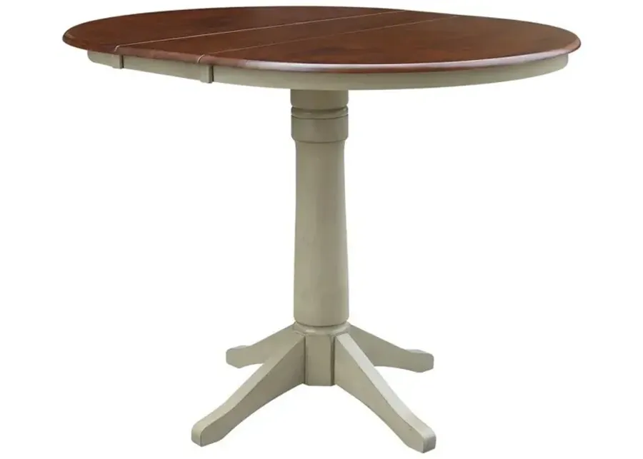 DINING ESSENTIALS 36 INCH EXTENSION TABLE WITH 36 INCH TRANSITIONAL PEDESTAL BASE IN ESPRESSO/ALMOND