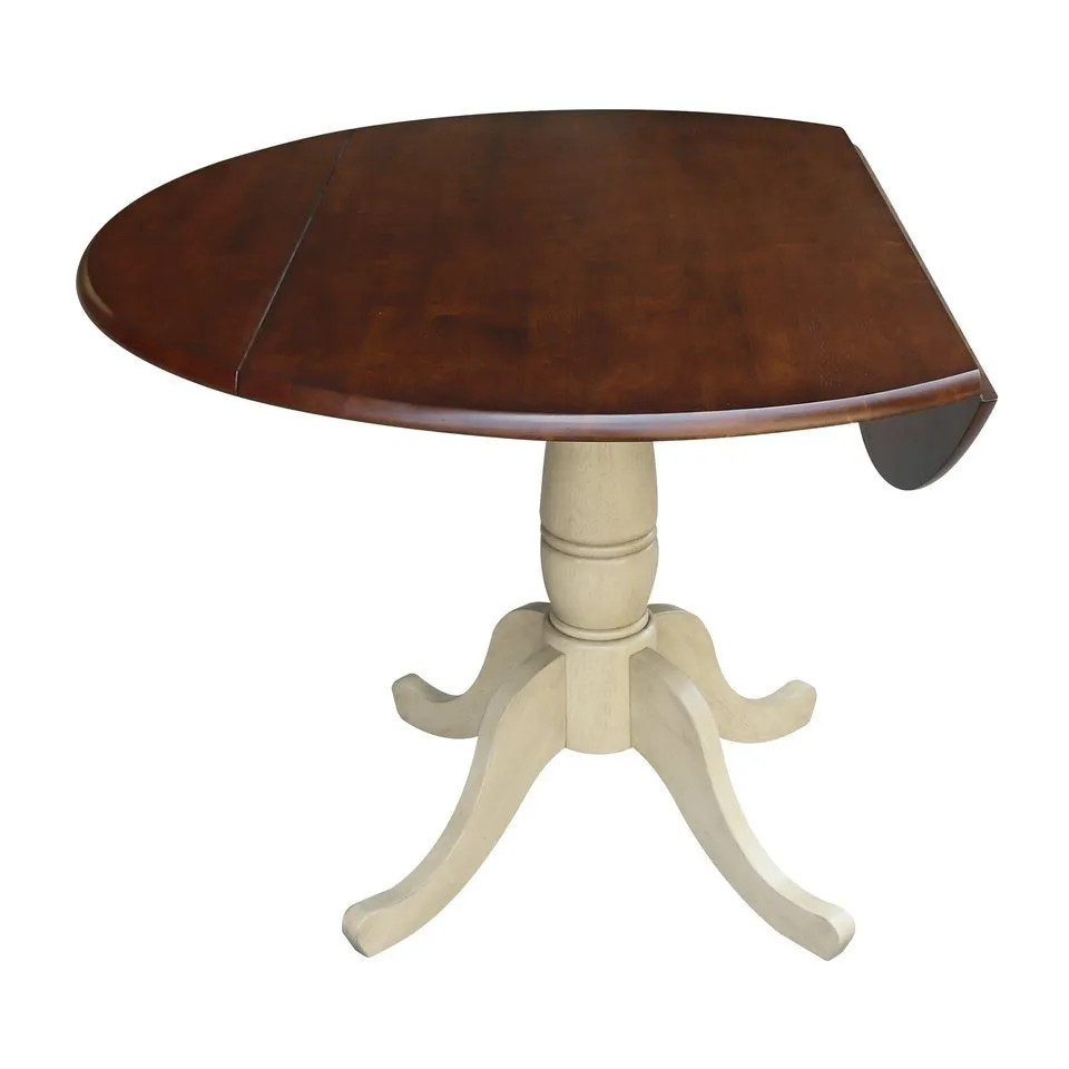 DINING ESSENTIALS ROUND DROP LEAF PEDESTAL TABLE IN ALMOND & ESPRESSO