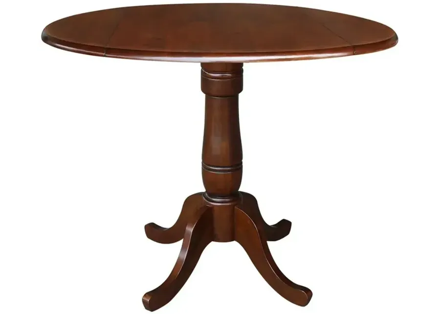 DINING ESSENTIALS 42 INCH DROP LEAF TABLE TOP WITH 36 INCH TRADITIONAL PEDESTAL BASE WITH EXTENSION IN ESPRESSO