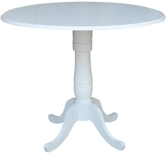 DINING ESSENTIALS 42 INCH DROP LEAF PEDESTAL TABLE TOP WITH 36 INCH TRADITIONAL PEDESTAL BASE WITH EXTENSION IN PURE WHITE