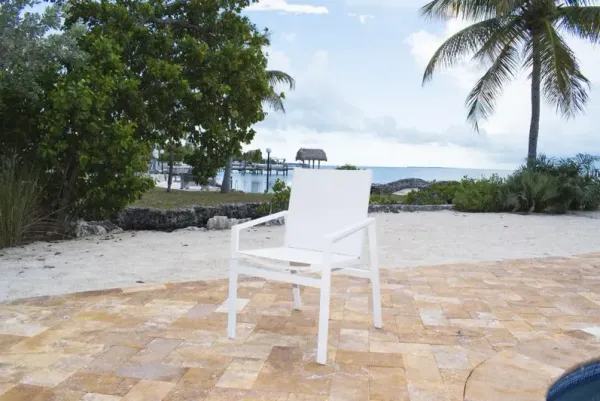 PANAMA JACK MYKONOS STACKABLE ARMCHAIR