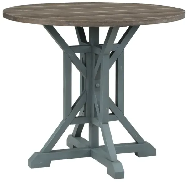 WHARF COASTAL ROUND COUNTER HEIGHT ACCENT DINING TABLE WITH PLANK STYLE TOP AND TRESTLE BASE