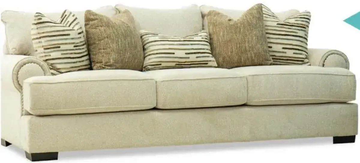 JAVELIN SOFA IN METEOR SAND, PILLOWS IN BROCK MARBLE AND AEROSMITH CINDER