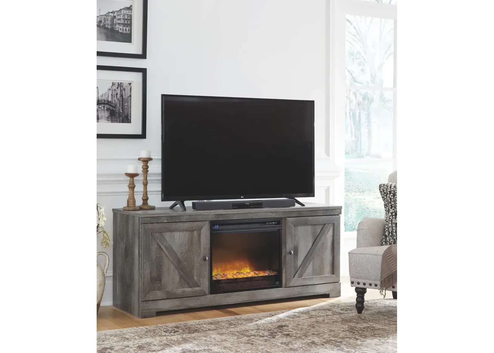 WYNNLOW 63" TV STAND WITH ELECTRIC FIREPLACE GRAY SIGNATURE DESIGN