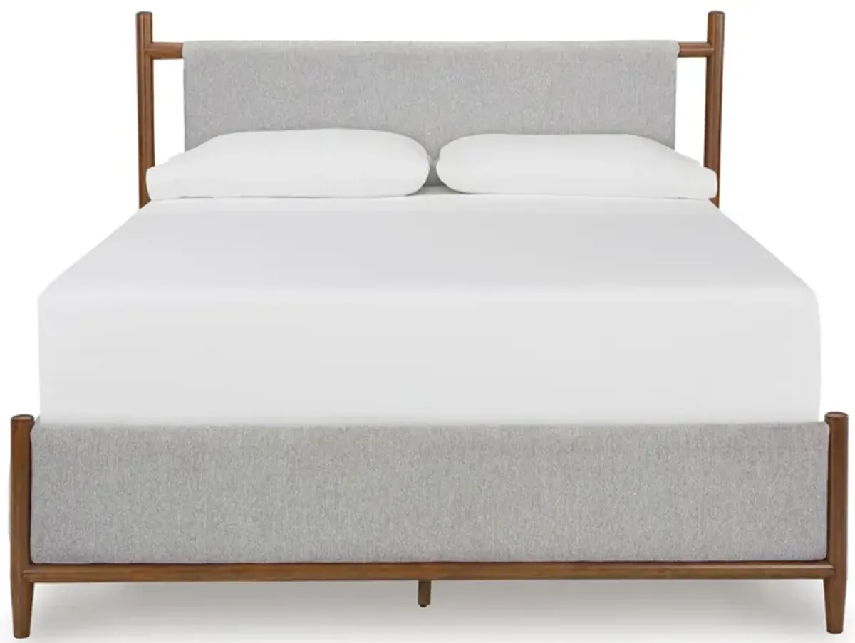 LYNCOTT KING UPHOLSTERED BED