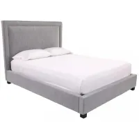 Cody Eastern King Upholstered Bed