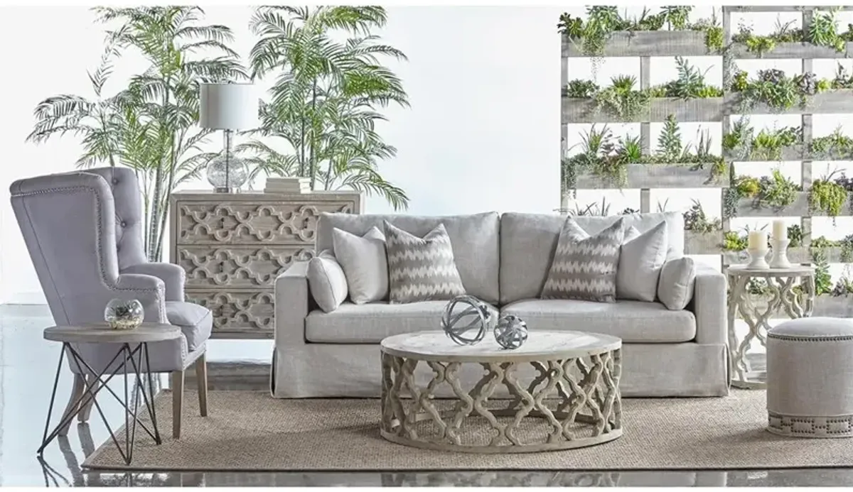Mario Modern Classic Cream Linen Upholstered Gold Nailhead Trim Round Ottoman