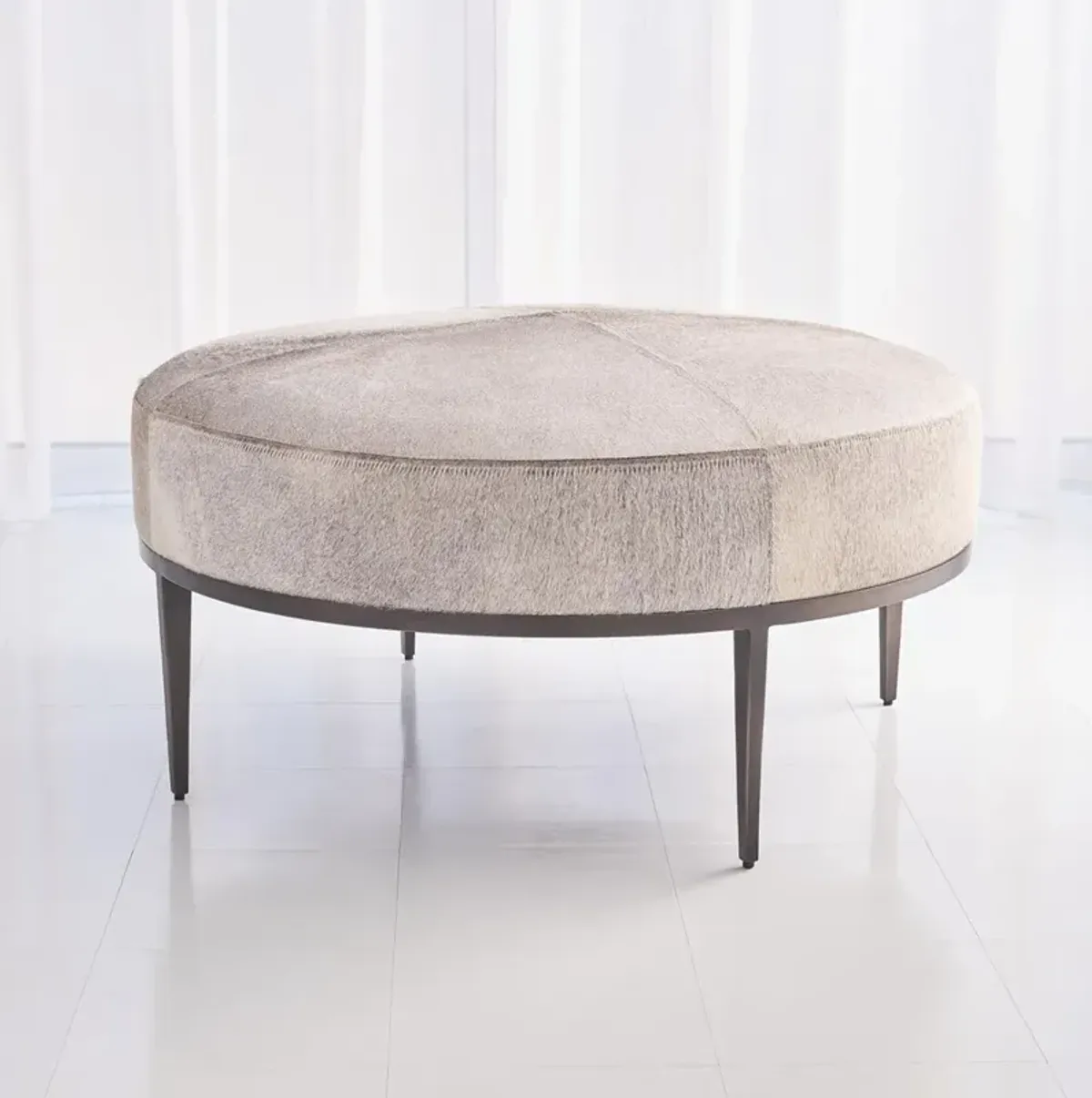 Odette Modern Classic Grey Hair On Hide Iron Round Cocktail Ottoman