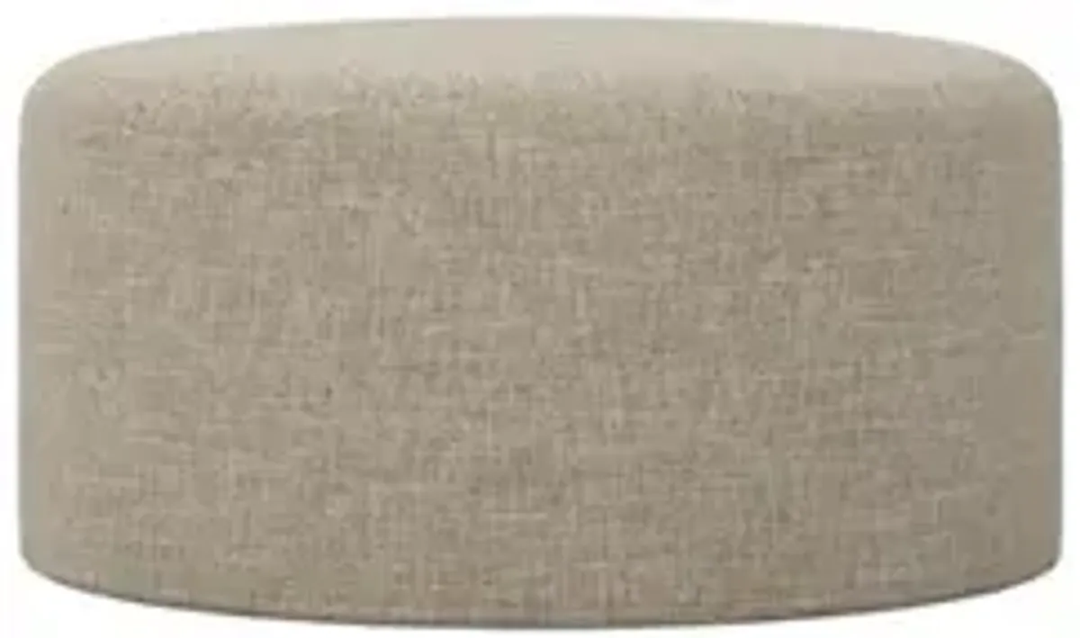 Lexie Sand Textured Weave Slipcovered Round Ottoman - 37”