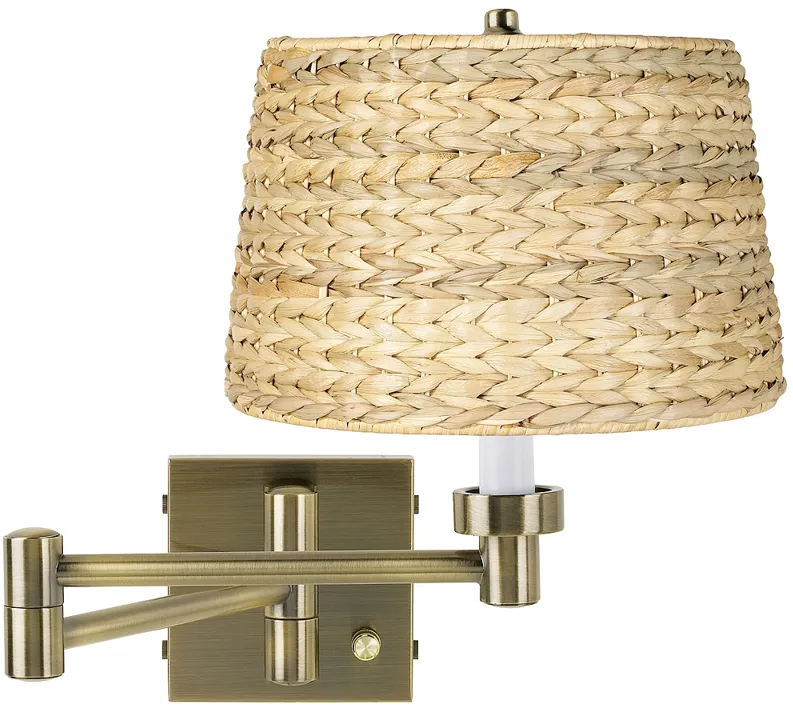 Barnes and Ivy Woven Seagrass Antique Brass Plug-In Swing Arm Wall Lamp
