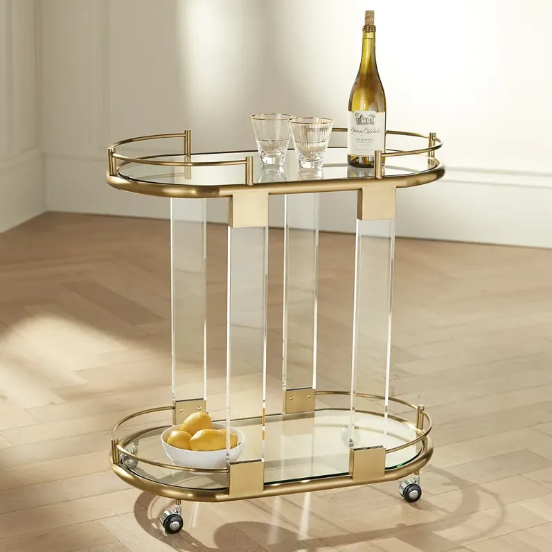 Adaline 29 1/2" Wide Clear Acrylic and Gold Oval Bar Cart