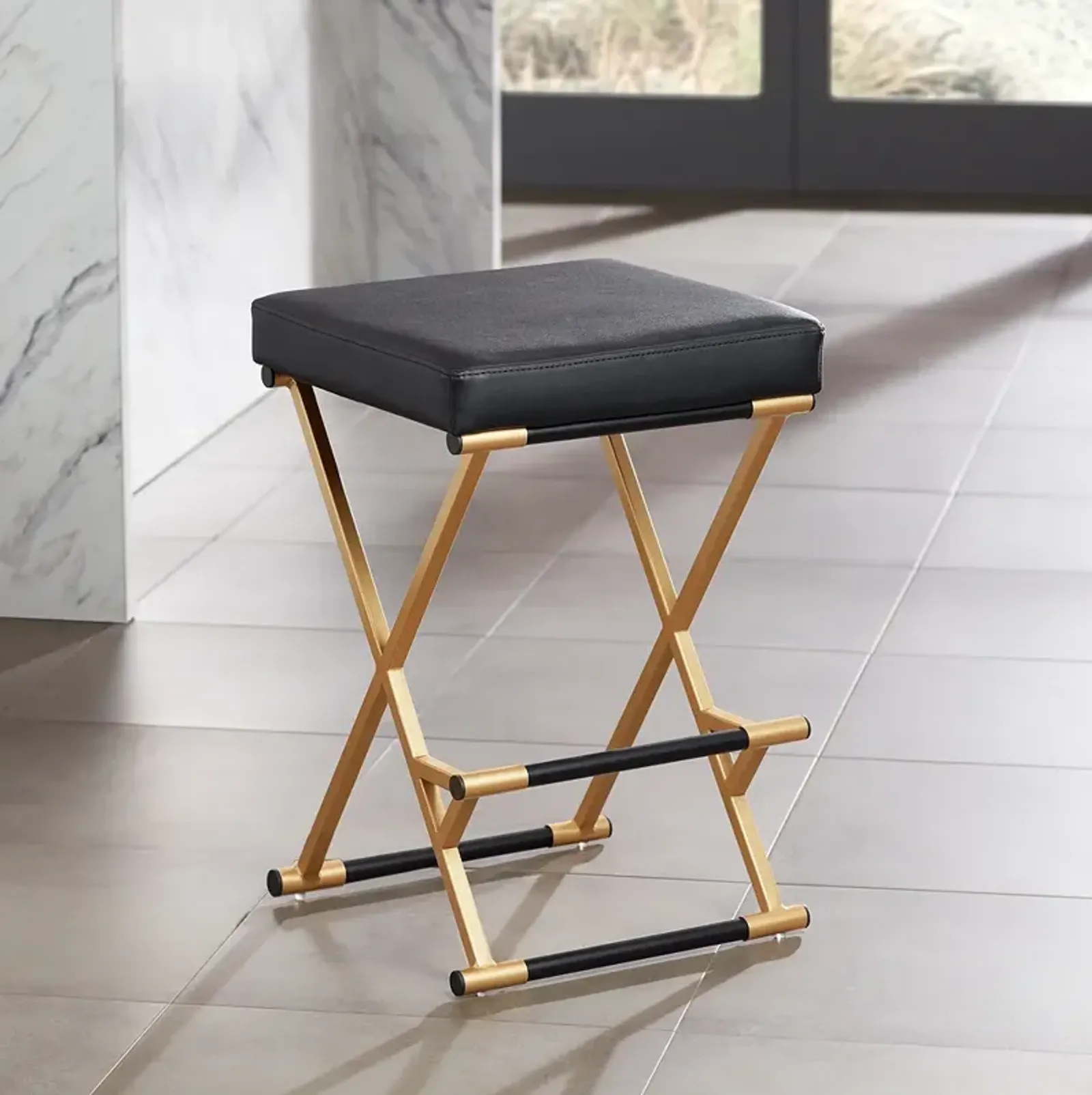 Carter 25" High Black Faux Leather and Gold Counter Stool