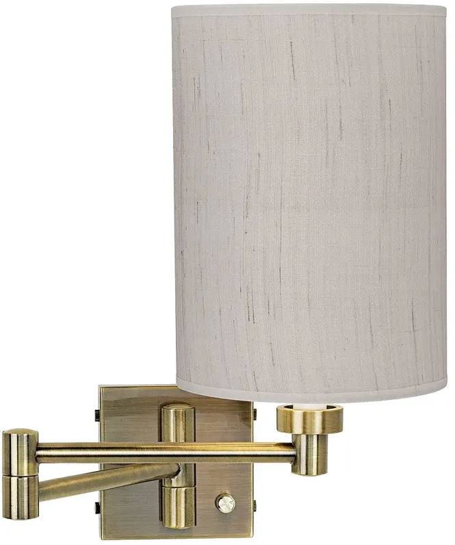 Barnes and Ivy Antique Brass Linen Shade Plug-In Swing Arm Wall Lamp