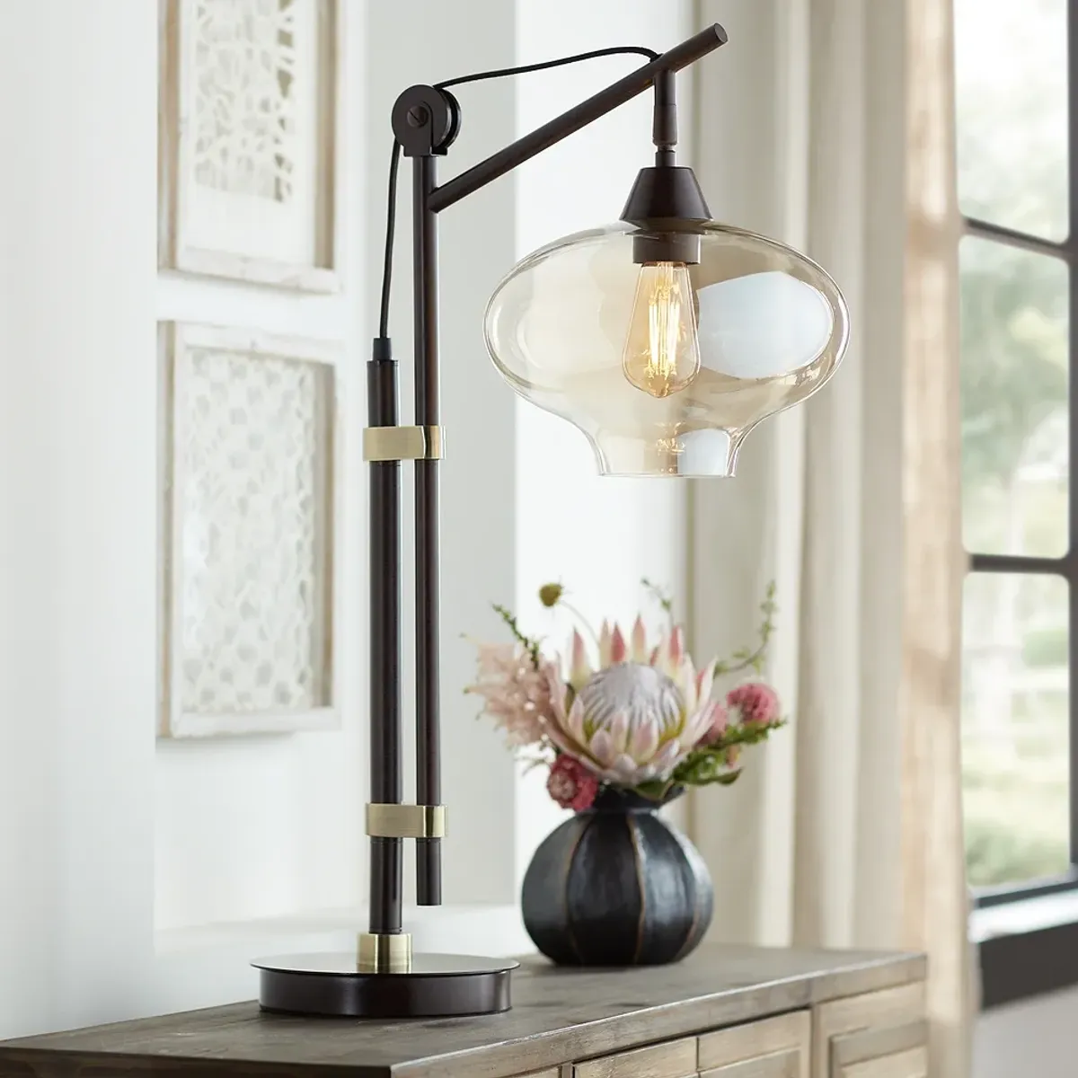 Franklin Iron Calyx Bronze and Cognac Glass Industrial Pulley Table Lamp