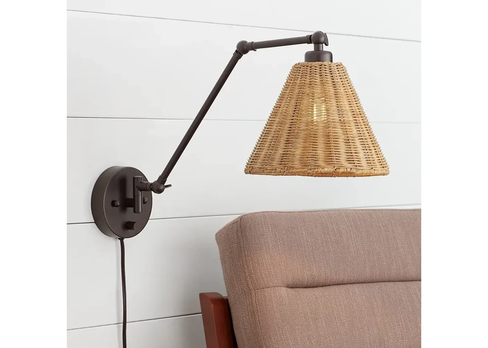 Barnes and Ivy Rowlett Bronze Rattan Shade Plug-In Wall Lamp