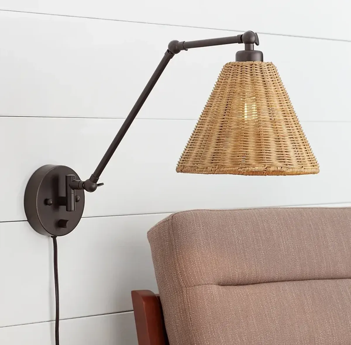 Barnes and Ivy Rowlett Bronze Rattan Shade Plug-In Wall Lamp