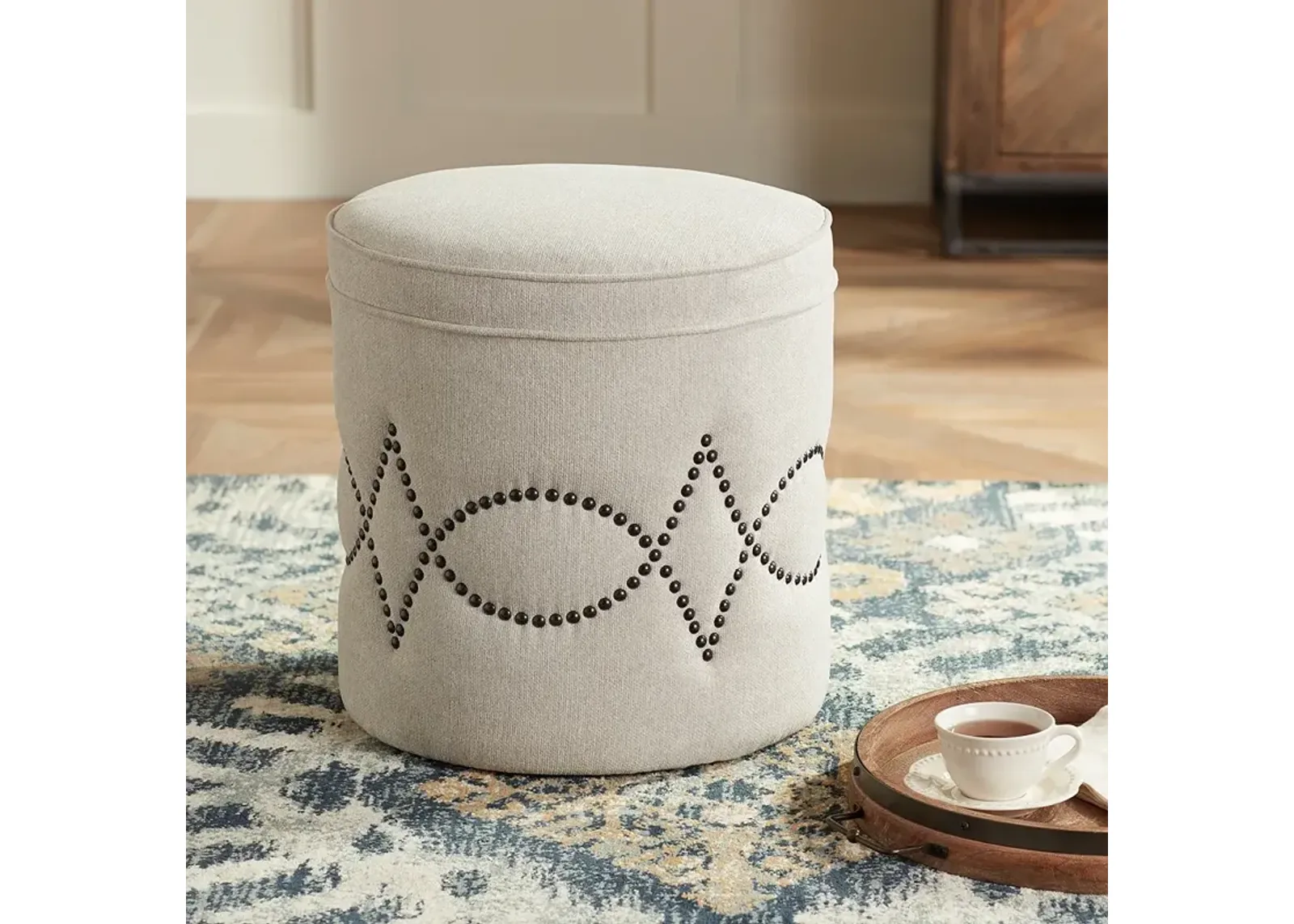 Iriza Oatmeal Nailhead Round Ottoman