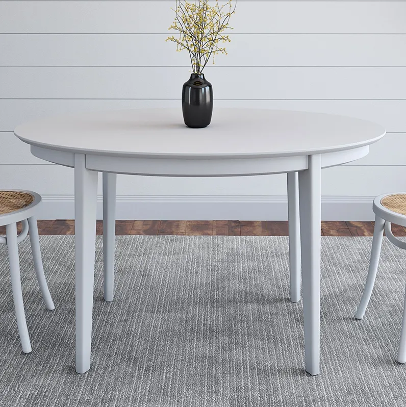 Atle 53 1/2" Wide Painted Matte White Wood Oval Dining Table