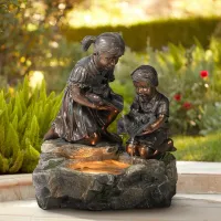 Girl and Boy with Lily Pad 23 1/2" High Lighted Fountain