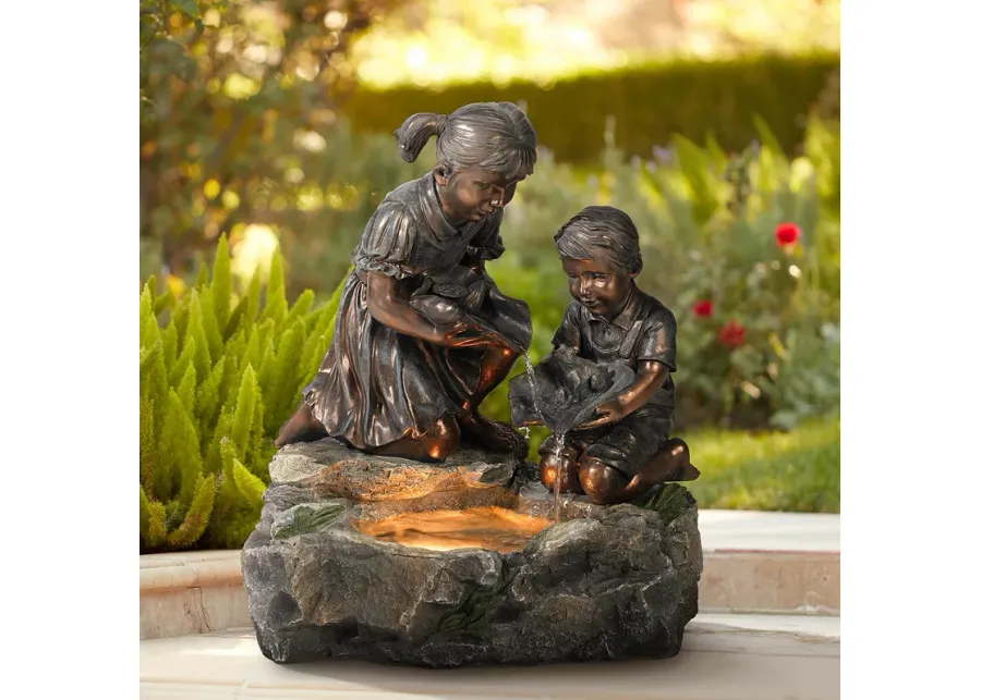 Girl and Boy with Lily Pad 23 1/2" High Lighted Fountain