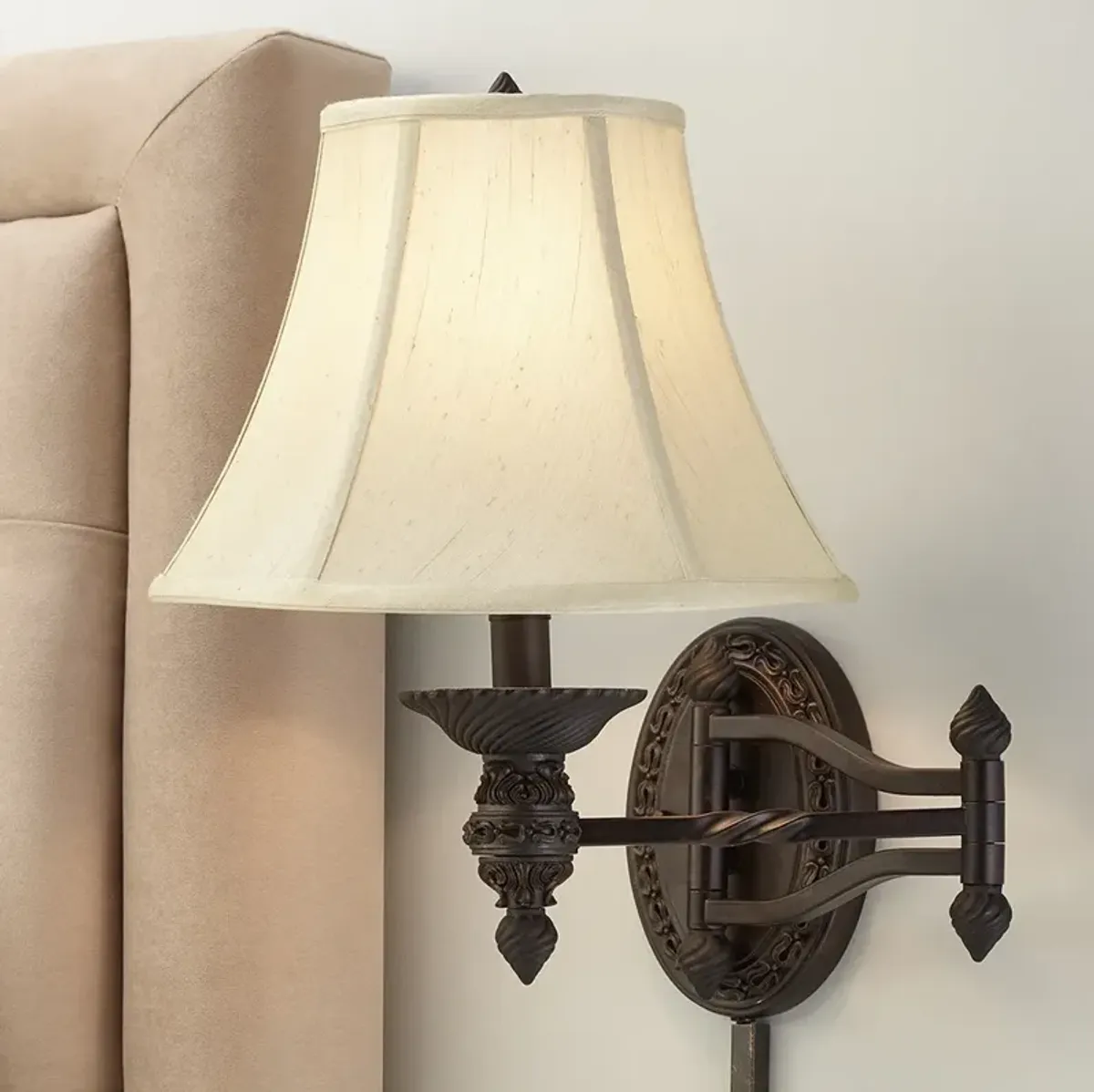 Barnes and Ivy Godia Bronze Oval Plug-In Swing Arm Wall Lamp