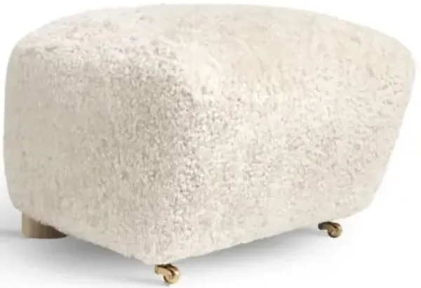 The Tired Man Sheepskin Ottoman