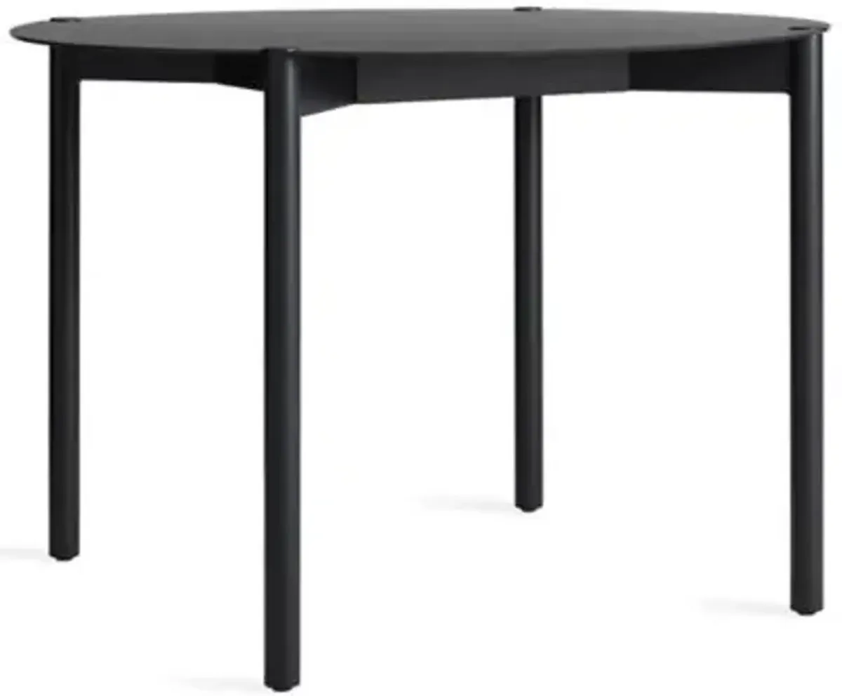 Comeuppance Round Dining Table