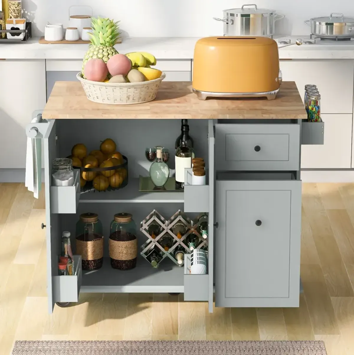 Rolling kitchen island with drop leaf and storage