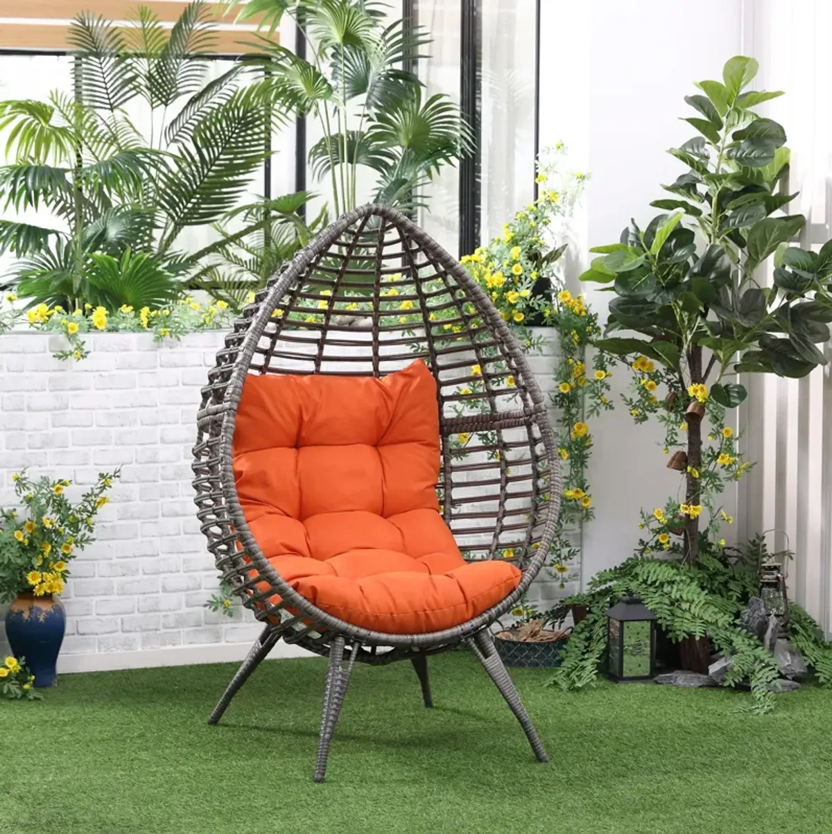 Orange Backyard Cocoon: Teardrop Wicker Lounge Chair with Cushion